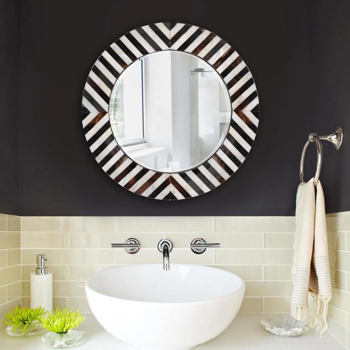 Additional view of the Julianna Mirror showing the repeated horn-and-shell tile pattern.