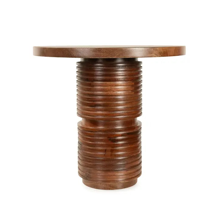 The Gabin Accent Table shown in a clean product view highlighting its carved mango wood ridges.