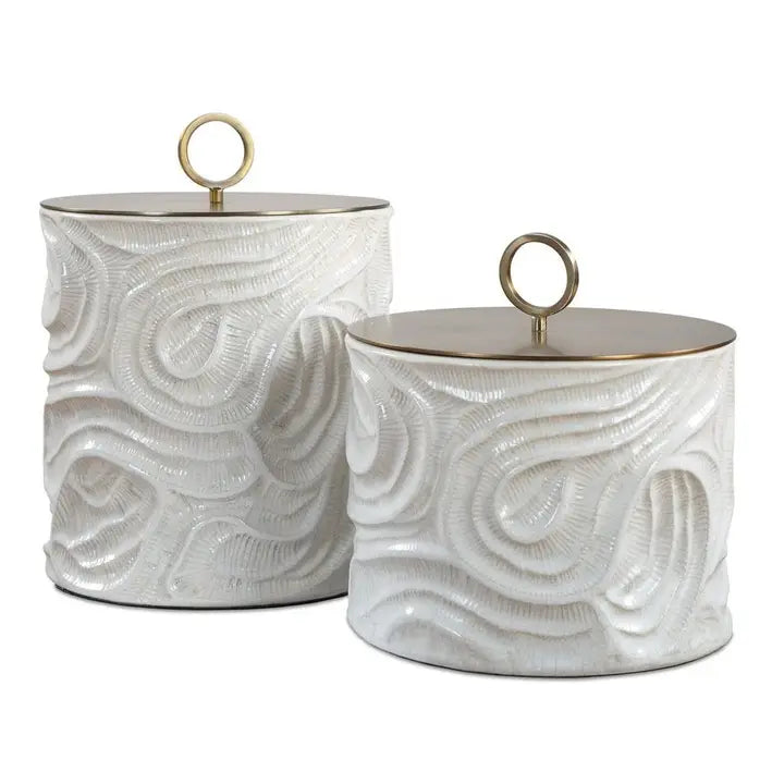 The Marée Canister Set shown in a clean product view highlighting its ivory waves & bronze lids.