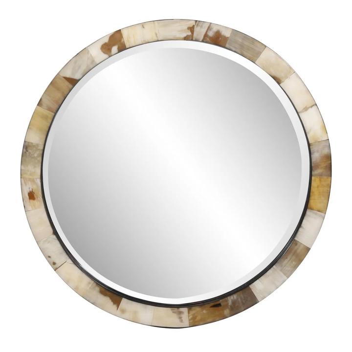 The Godfrey Horn Mirror with cream and beige buffalo-horn tiles around a round reflective center.