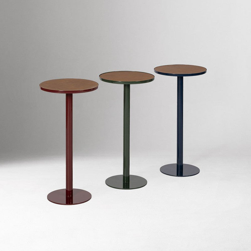 The Hugo Drink Table styled in a refined modern interior, showing its realistic scale, materials, and relationship to surrounding furnishings.