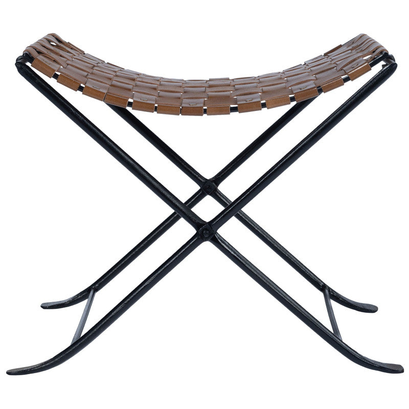 The Pascal Leather Stool styled in a refined modern interior, showing its realistic scale, materials, and relationship to surrounding furnishings.