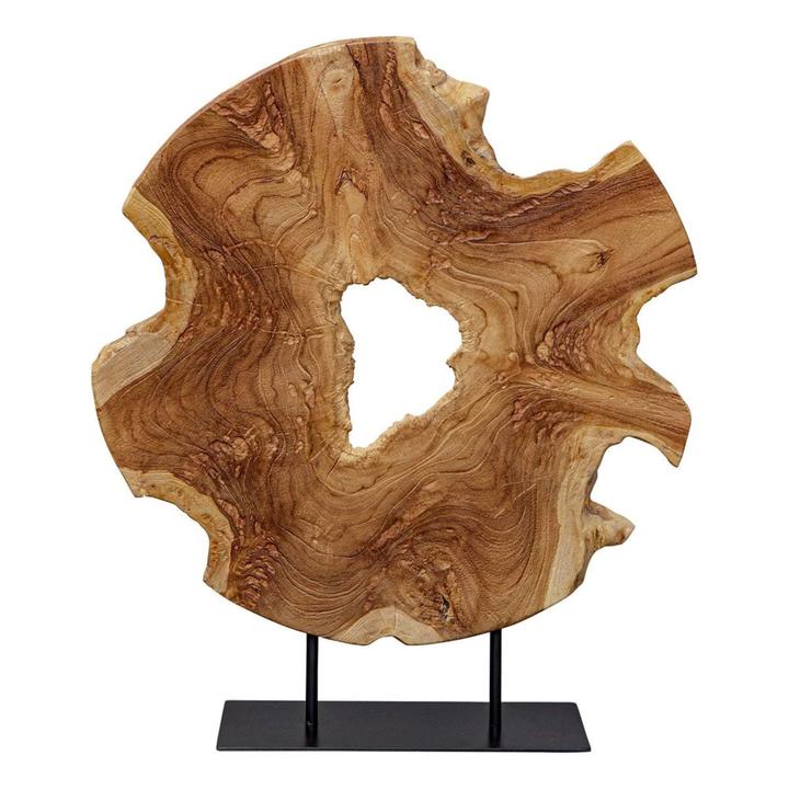 Front view of The Bastien Wood Sculpture in natural teak, showing its irregular perimeter, central opening, and black metal base.