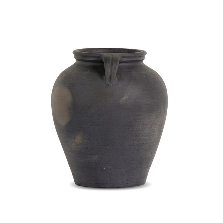 Full view of the Coralie Terracotta Vessel showing its aged-black earthen surface and grounded rounded silhouette.