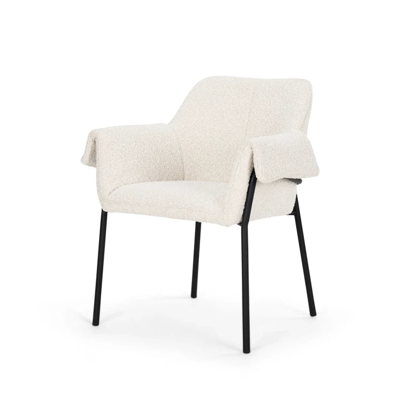 The Mathilde Accent Chair styled in a refined modern interior, showing its realistic scale, materials, and relationship to surrounding furnishings.