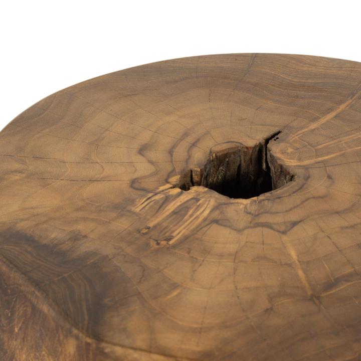 Angled view of the Corinne Teak Root End Table highlighting organic edges, knots, and grain movement.