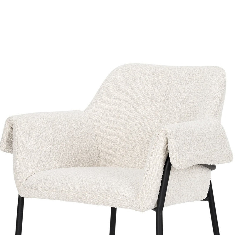 The Mathilde Accent Chair in a second editorial interior setting, emphasizing its proportions, finish, and use within a layered L’Élément de Joie room.