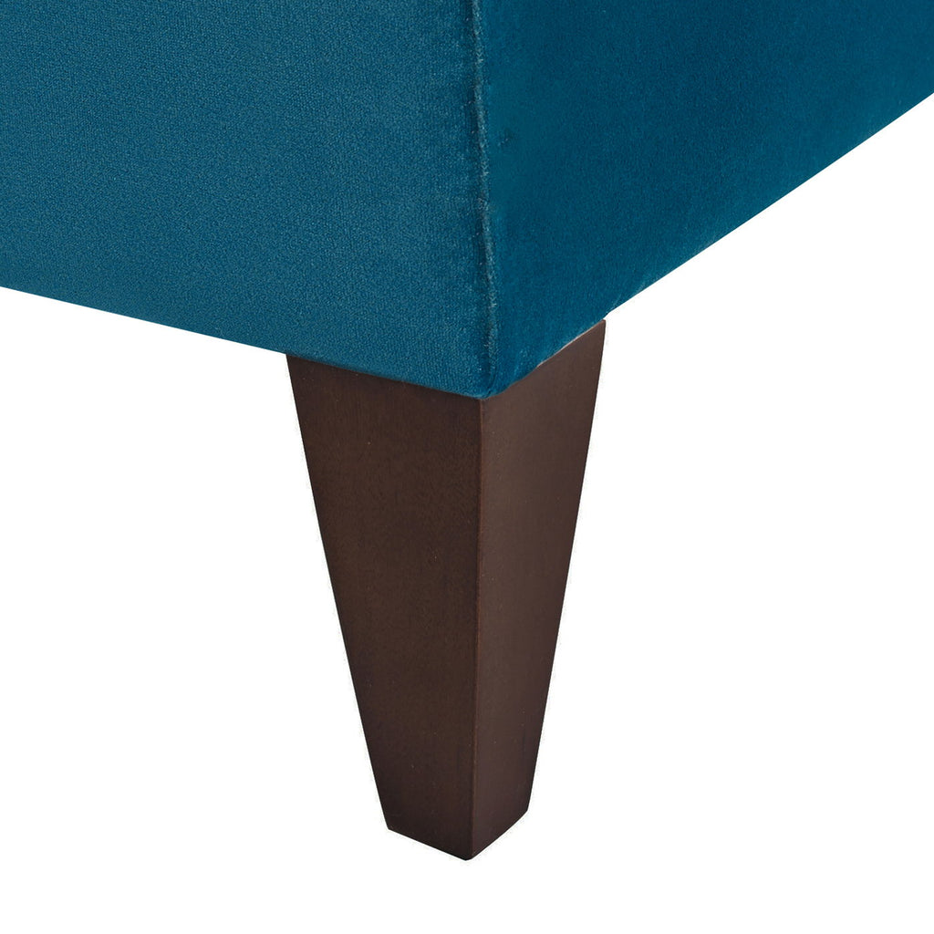 Minimalist 84-inch sofa from the Cadence collection featuring a crisp tuxedo silhouette and tapered accent legs in teal blue. Leg detail
