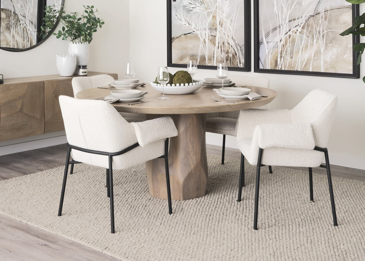 The Mathilde Accent Chair shown in a clean product view highlighting its materials, finish, and overall silhouette.