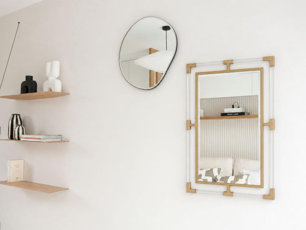 Detail view of the Gabrielle Mirror highlighting the clear solid acrylic square bars.