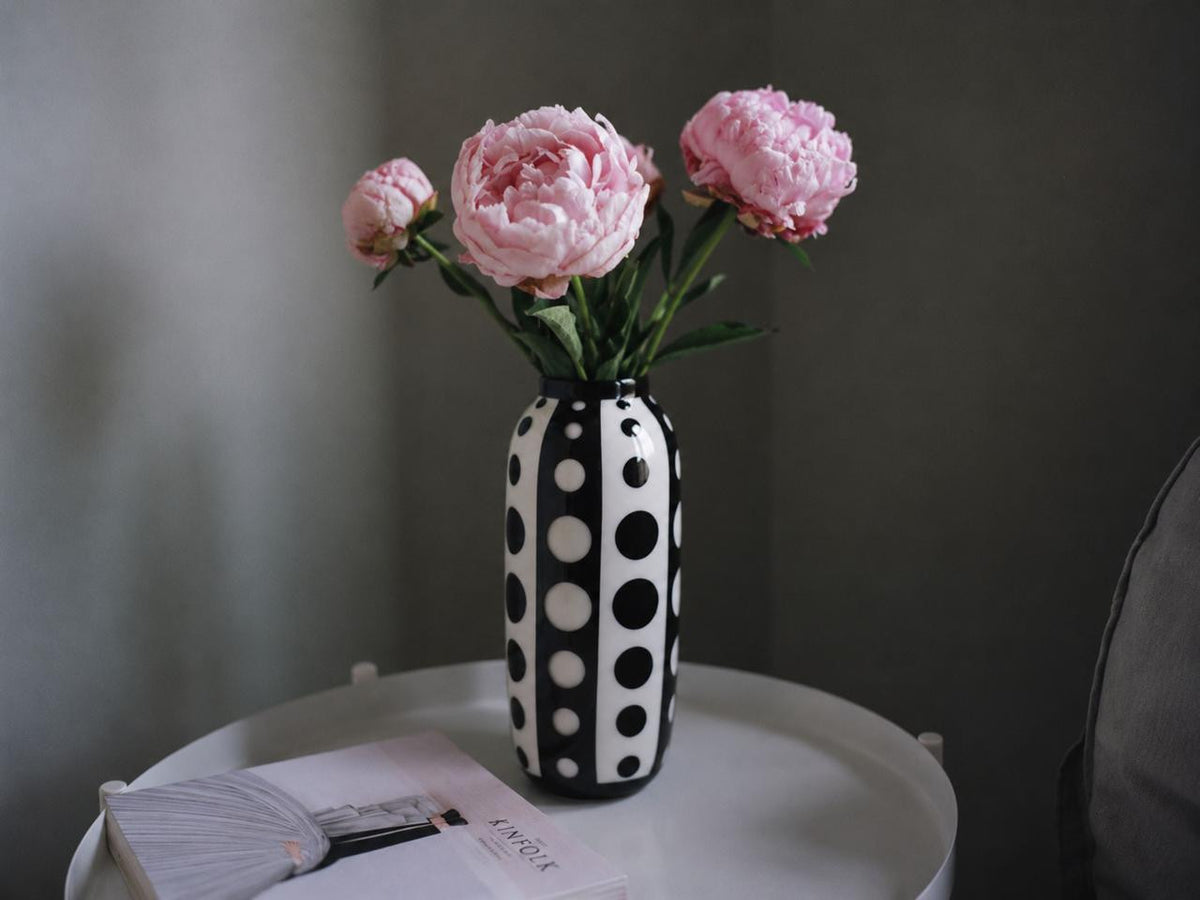 Additional view of the Cicero Large Vase emphasizing the layered black, white, and clear glass surface.