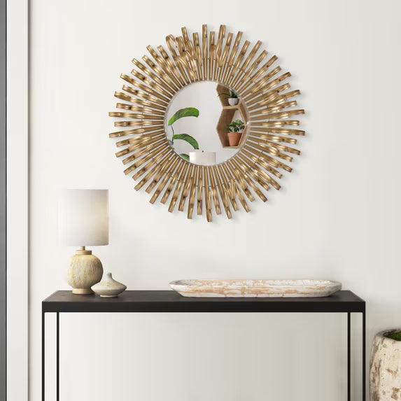 Alternate product view of the Bérénice Mirror showing the compact 27-inch round profile and layered gold-finished radial frame.