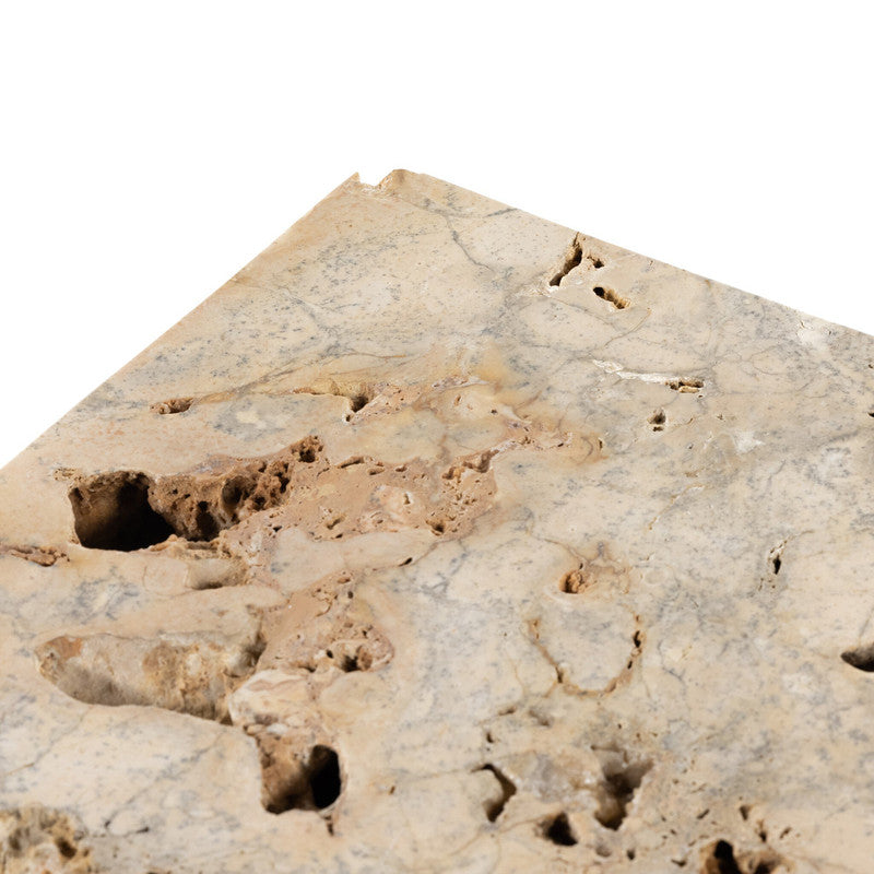 Alternate view of The Palu Accent Table highlighting the travertine’s open cavities, mineral deposits, and warm tonal variation.