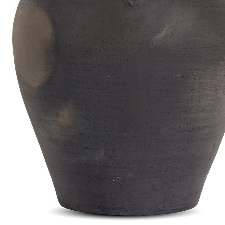 Profile view of the Coralie Terracotta Vessel emphasizing its compact sculptural proportions.