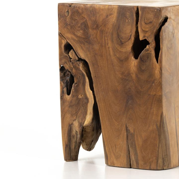 Close view of the Fabienne Teak Root Accent Table emphasizing pronounced grain, knots, and tonal variation.