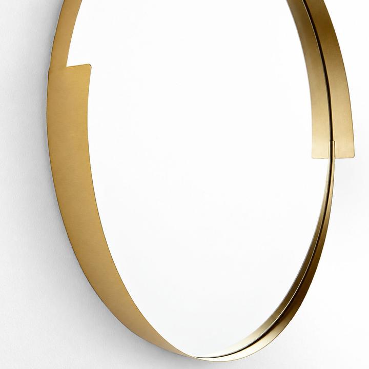 Additional view of the Aurore Mirror showing its compact round profile and layered perimeter.