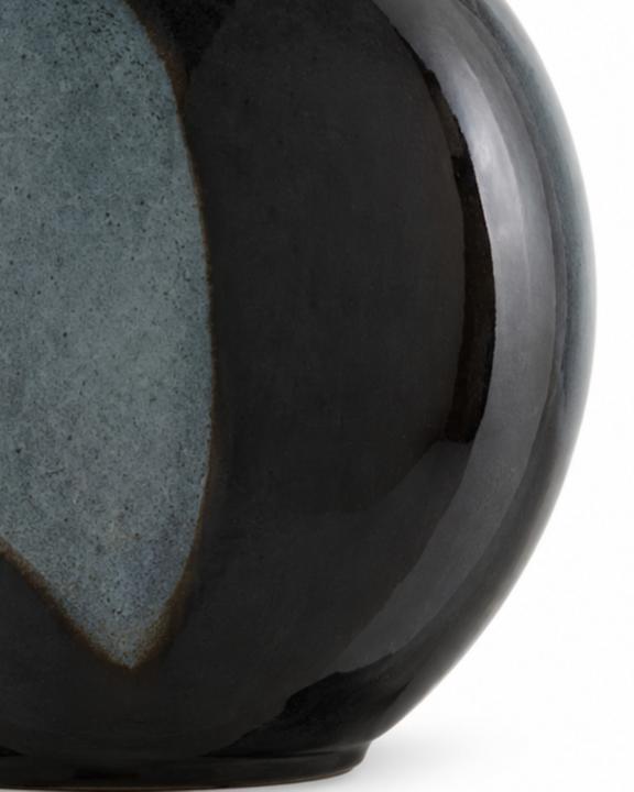 The Let Us Twist the Glass Round Vase shown in another view with its compact rounded proportions.