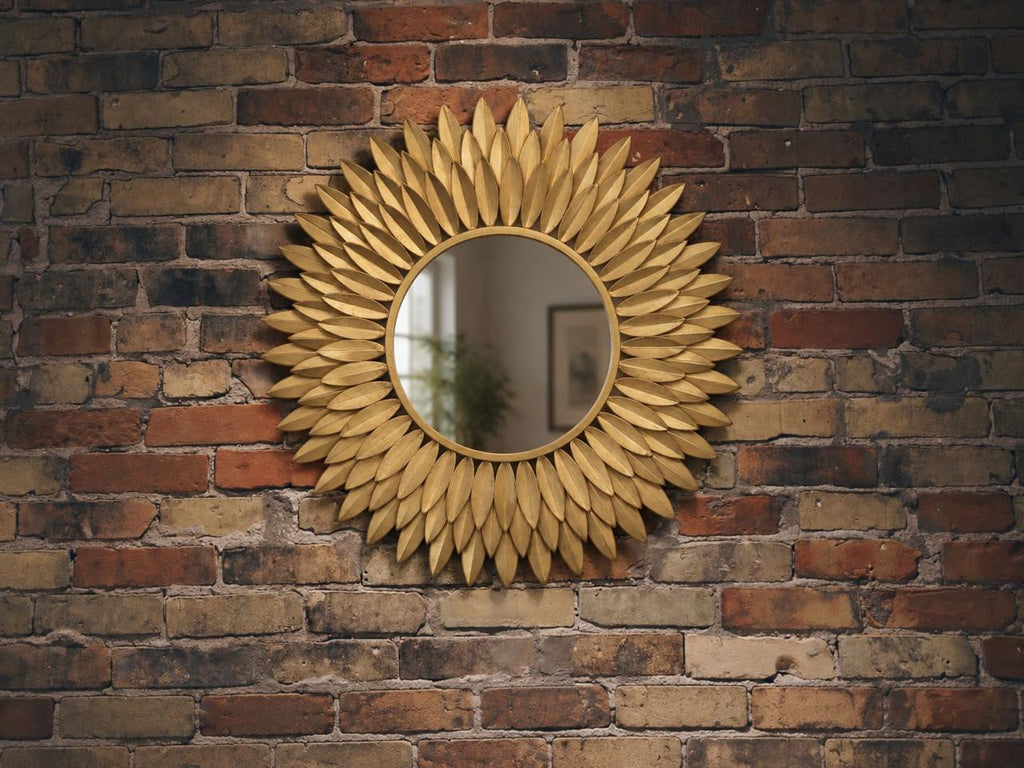 Additional product view of the Broche Mirror showing the balance of reflective center and sculptural leaf frame.