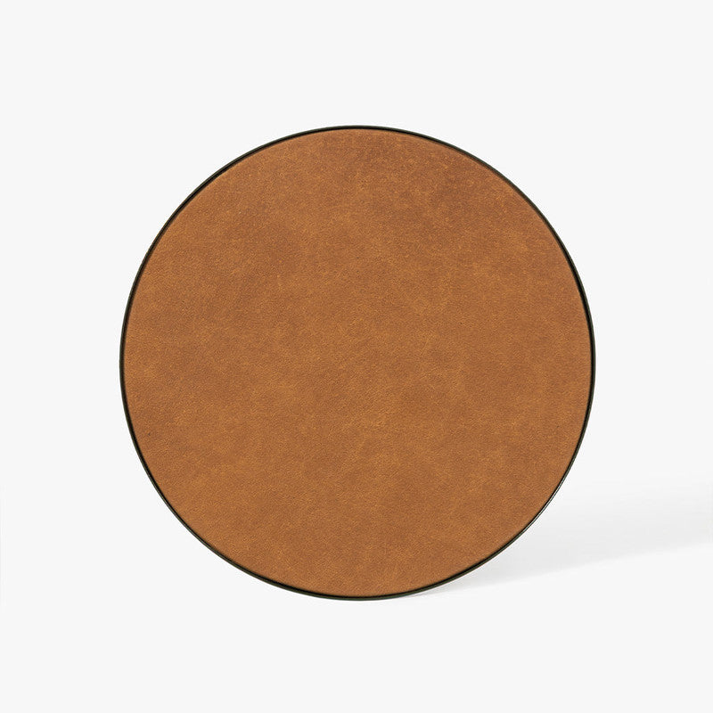 Detail view of The Hugo Drink Table showing the relationship between its form, edges, and finish.