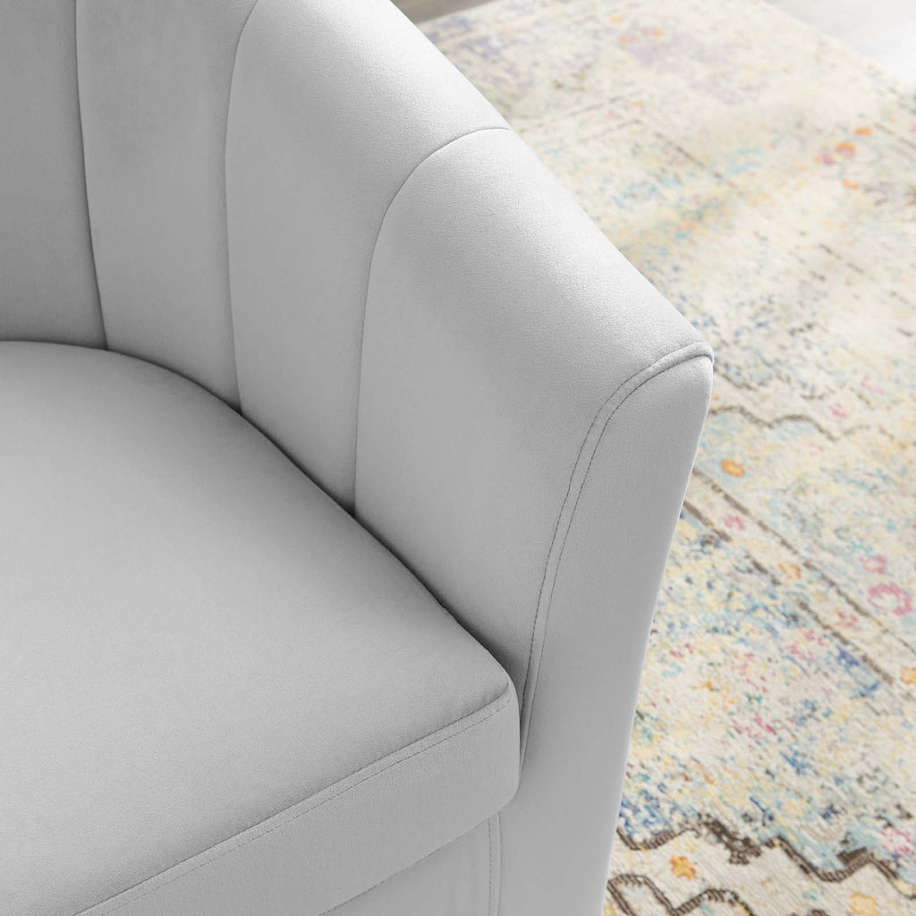 Close-up of channel tufting detail on the Adeline Armchair's ivory velvet backrest