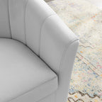 Close-up of channel tufting detail on the Adeline Armchair's ivory velvet backrest