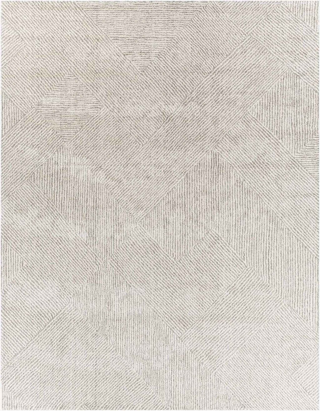 Close-up of tonal ivory and gray interlocking diamond weave pattern on high pile rug