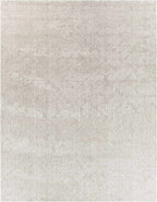 Close-up of tonal ivory and gray interlocking diamond weave pattern on high pile rug