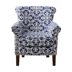 Close-up of the silver nailhead trim and espresso leg on the Anaïs Club Chair