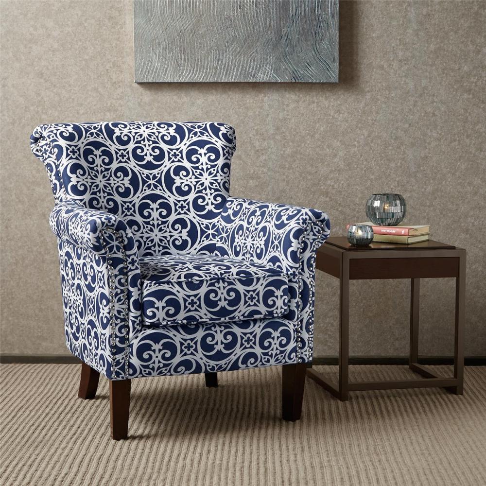 Navy patterned club chair with silver nailhead trim and espresso wood legs, shown straight-on