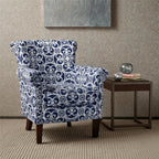 Navy patterned club chair with silver nailhead trim and espresso wood legs, shown straight-on