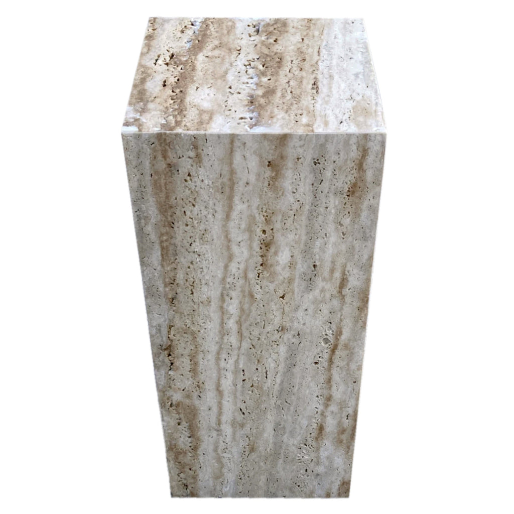 Front view of travertine cube side table showing vertical veining and natural stone pitting