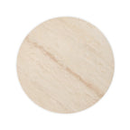 Overhead view of the round travertine tabletop showing natural stone variation