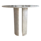 Side view of marble dining table showing gap between twin curved column legs
