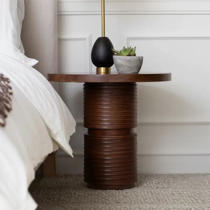 The Gabin Accent Table styled in a refined contemporary interior, showing its realistic scale and material character in room context.