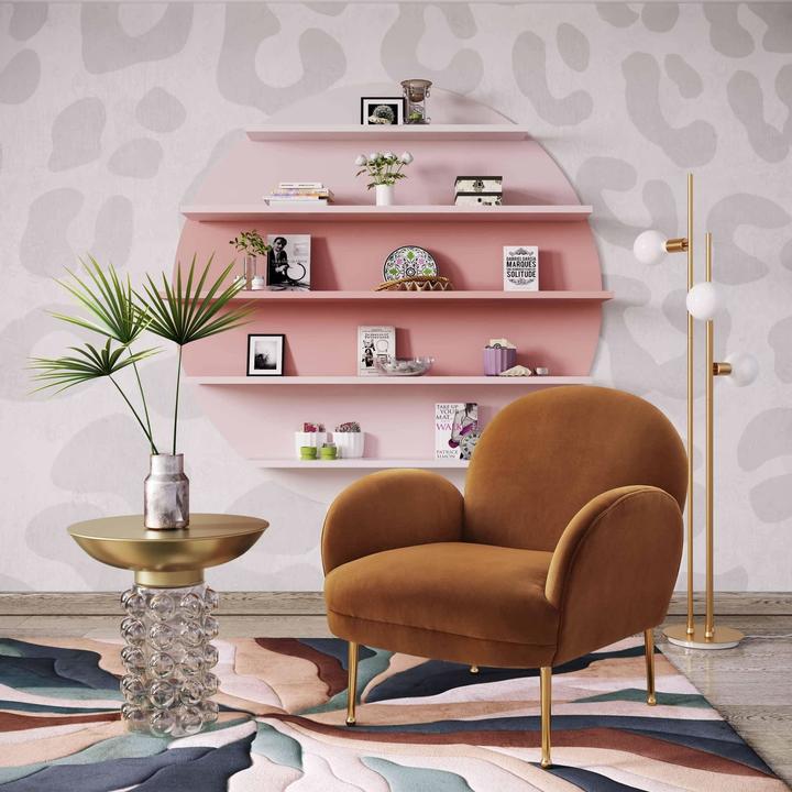 The Perrine Side Table styled in a refined contemporary interior, showing its realistic scale and material character in room context.