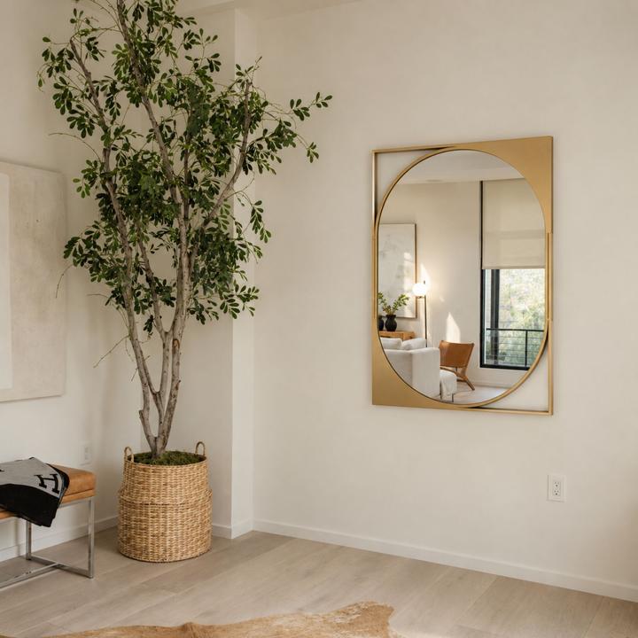The Diane Mirror styled in a contemporary interior, showing its scale and material character in room context.