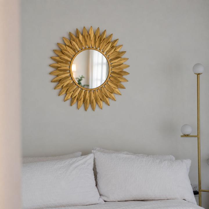 The Broche Mirror styled in a contemporary interior, showing its scale and material character in room context.