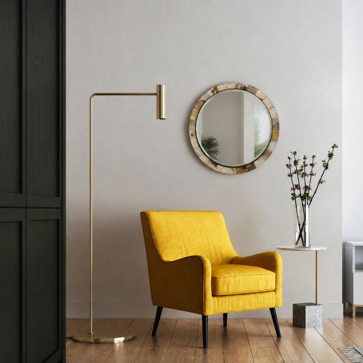 The Godfrey Horn Mirror styled in a contemporary interior, showing its scale and material character in room context.