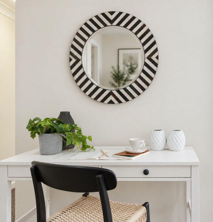 The Julianna Horn & Shell Mirror styled in a contemporary interior, showing its scale and material character in room context.