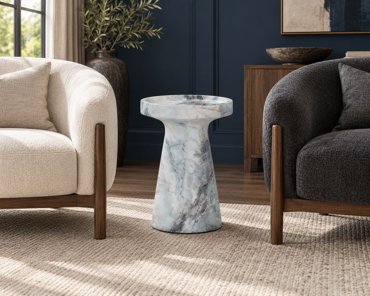 The Léandre Side Table in a second editorial interior setting, showing the piece in relation to surrounding furnishings.