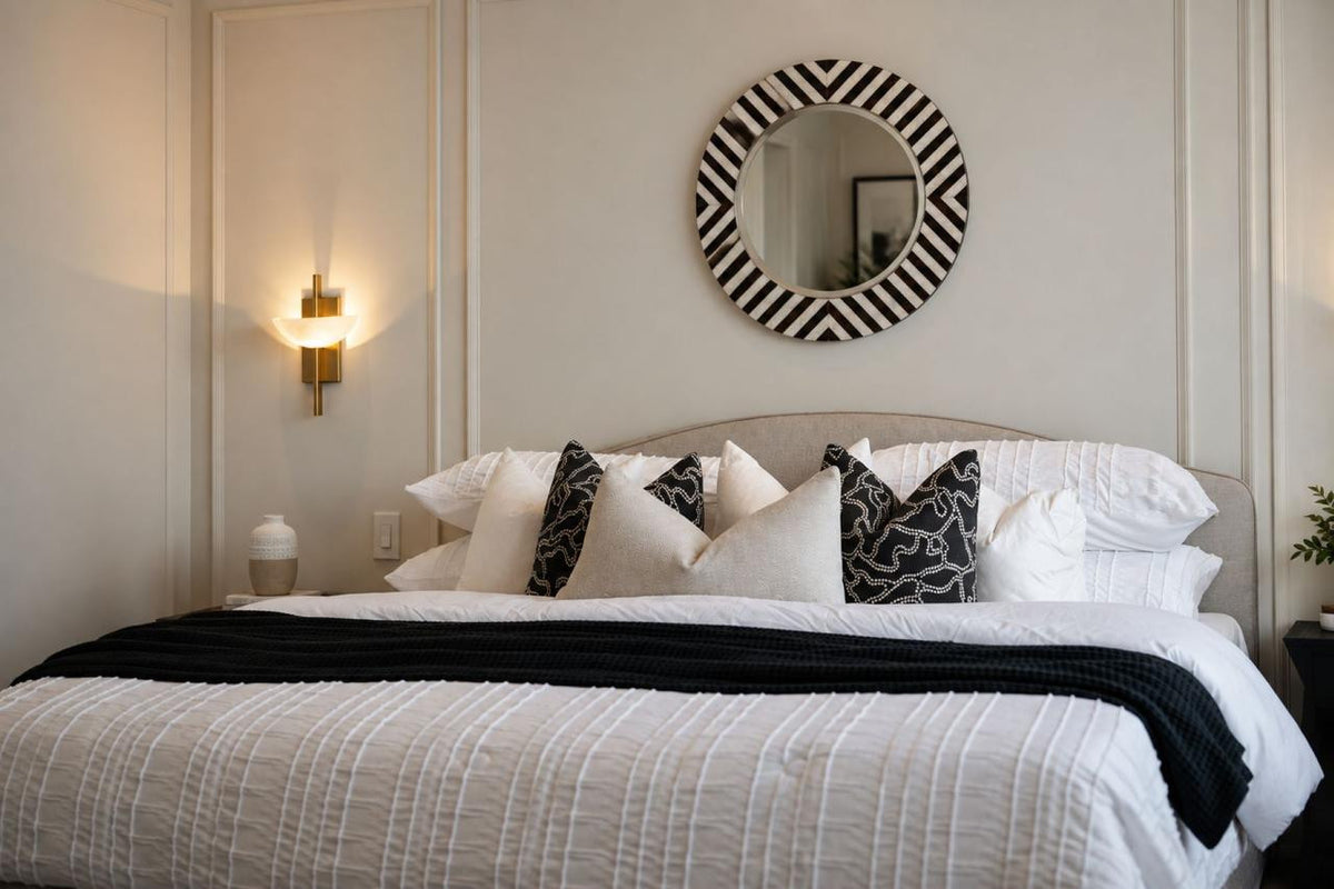 The Julianna Horn & Shell Mirror in a second editorial interior setting, showing the piece in relation to surrounding furnishings.