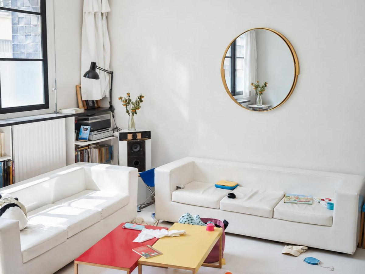 The Aurore Mirror in a second editorial interior setting, showing the piece in relation to surrounding furnishings.
