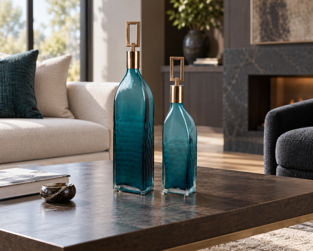 The Coralie Glass Bottle Set in a second editorial interior setting, showing the piece in relation to surrounding furnishings.