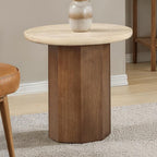The Elodie End Table styled with a ceramic vase, showing the travertine top's natural veining and oak pedestal detail.