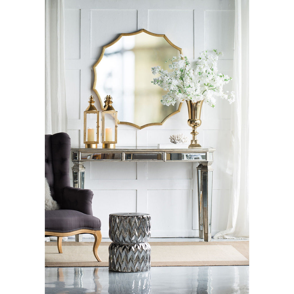 Gold scalloped sunburst mirror shown in full against a white background