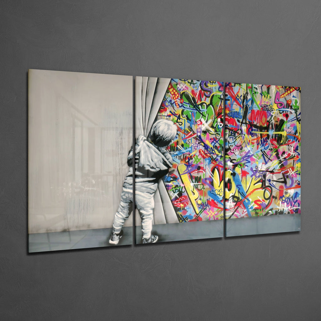 Colorful glass triptych mounted on a dark textured living room wall