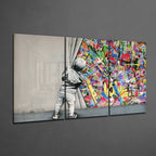 Colorful glass triptych mounted on a dark textured living room wall