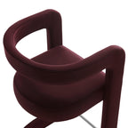 Close-up of the continuous curved backrest and armrest line on the Margot Counter Stool
