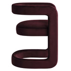 Side view of the Margot Dining Chair showing the continuous curved open backrest in aubergine velvet