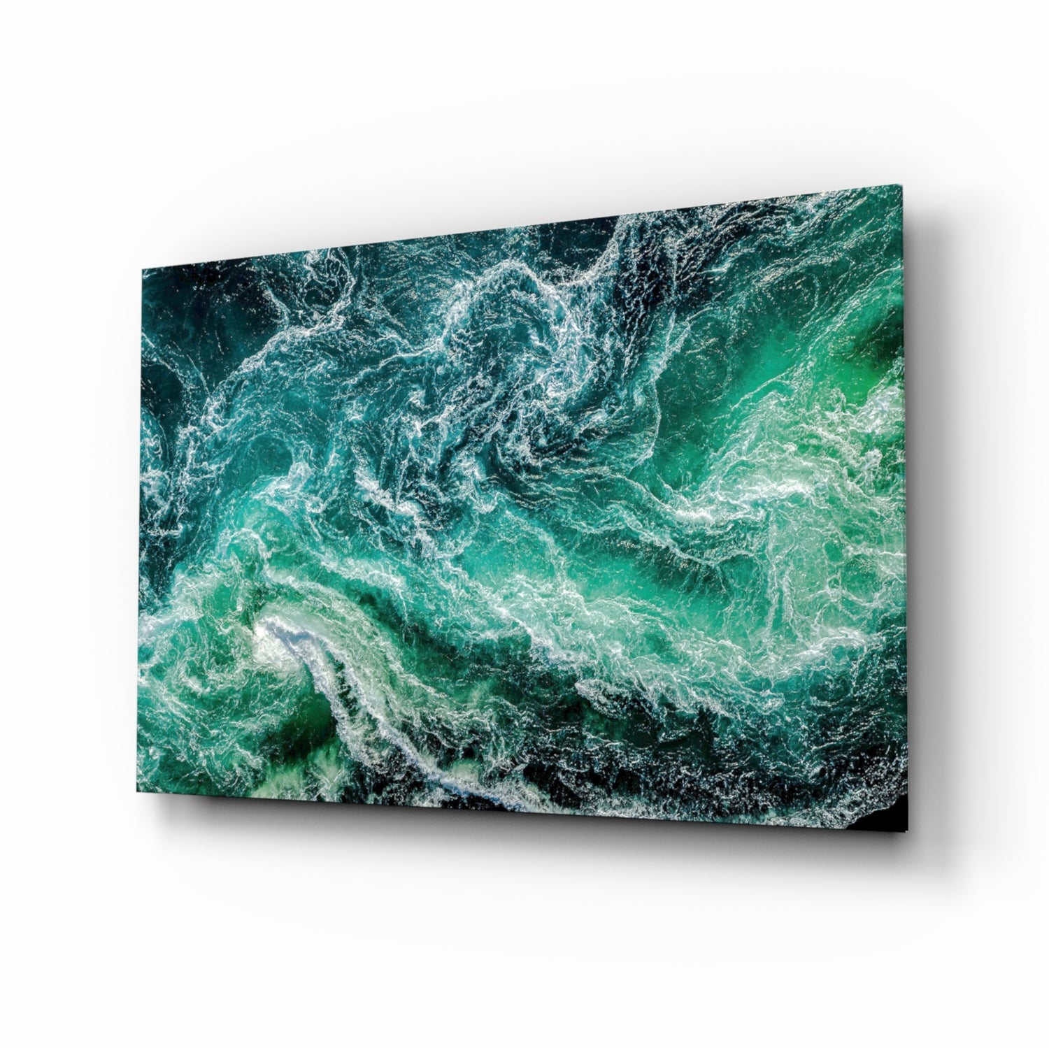 Emerald ocean wave print on a high-gloss acrylic panel, shown at a side angle